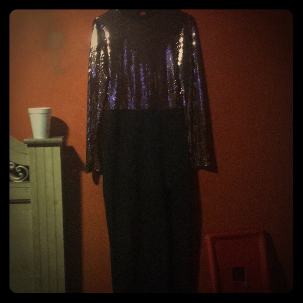 A long sleeve sequence dress